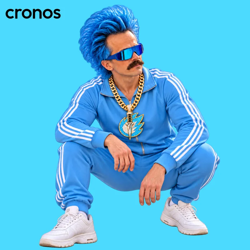 Colt squatting in his track suit and KULT chain